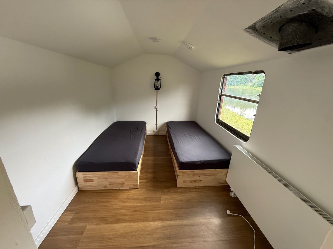 🛏️ Schlafplatz für 2 – Bauwagen Angelpark Neue Mühle